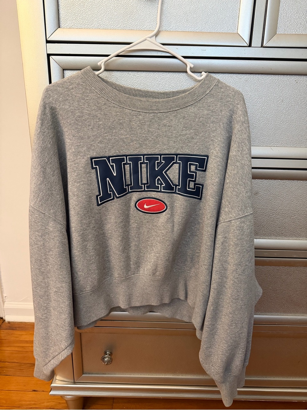 Nike Gray Crewneck Sweatshirt with Navy Graphic and Red Swoosh